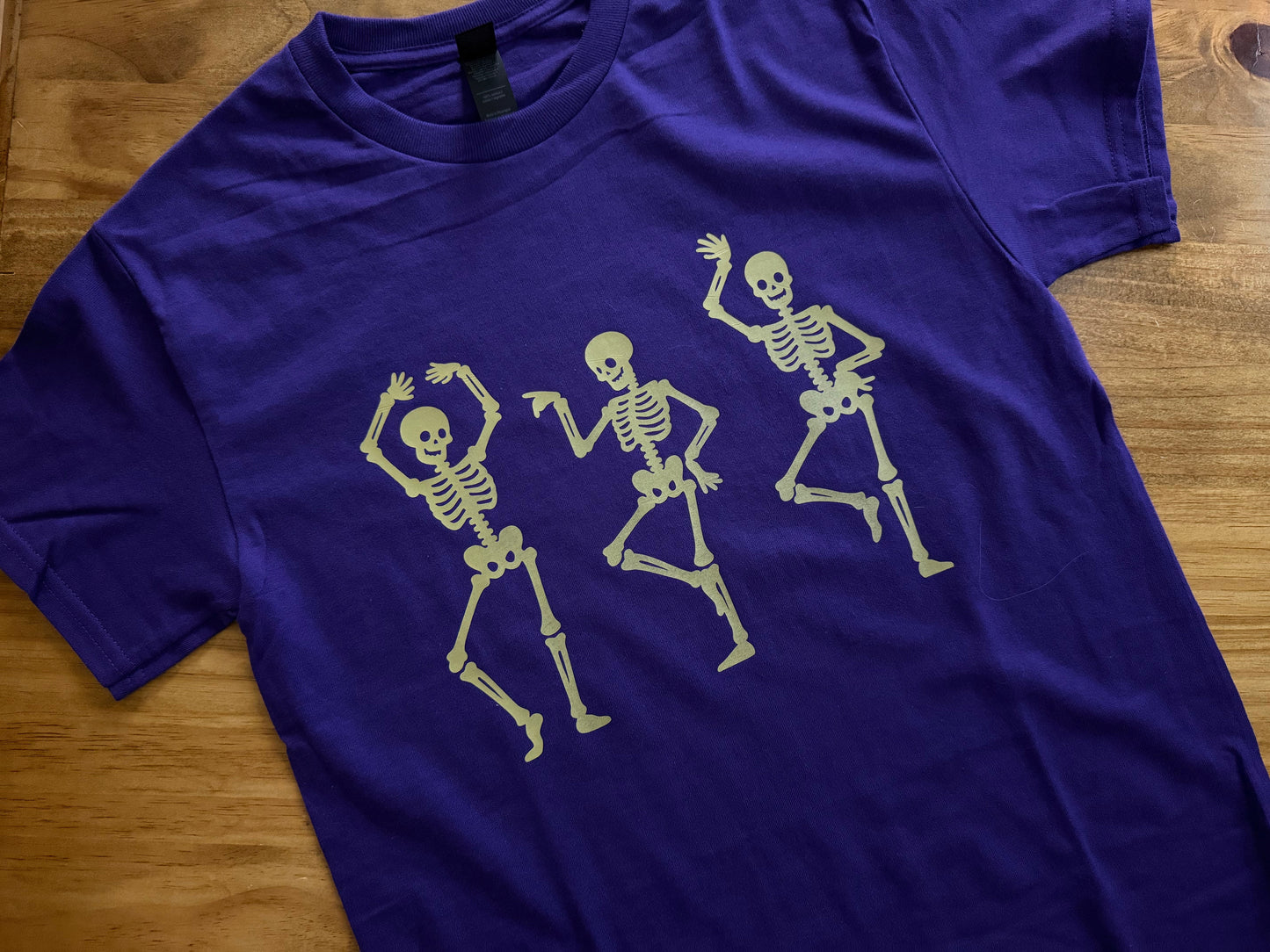 Dancing Skeletons Tee – Purple with Mustard Yellow Design